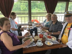 Seniors sitting around a table